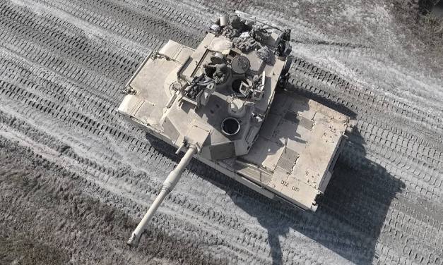 Steel and Silicon: The Case for Teaming Armored Formations with UAVs