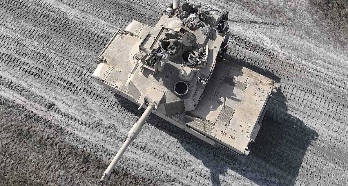 Steel and Silicon: The Case for Teaming Armored Formations with UAVs